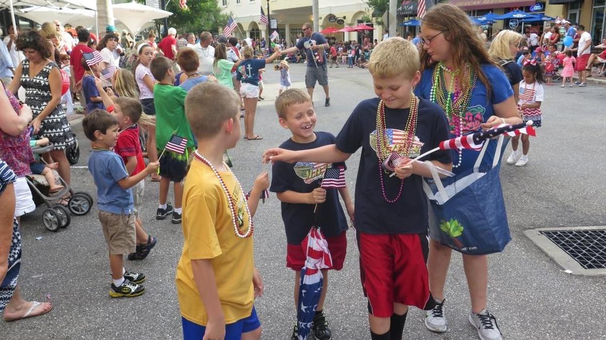 Children enjoy the festivities at a past Tribute to Heroes parade at Lakewood Ranch Main Street.