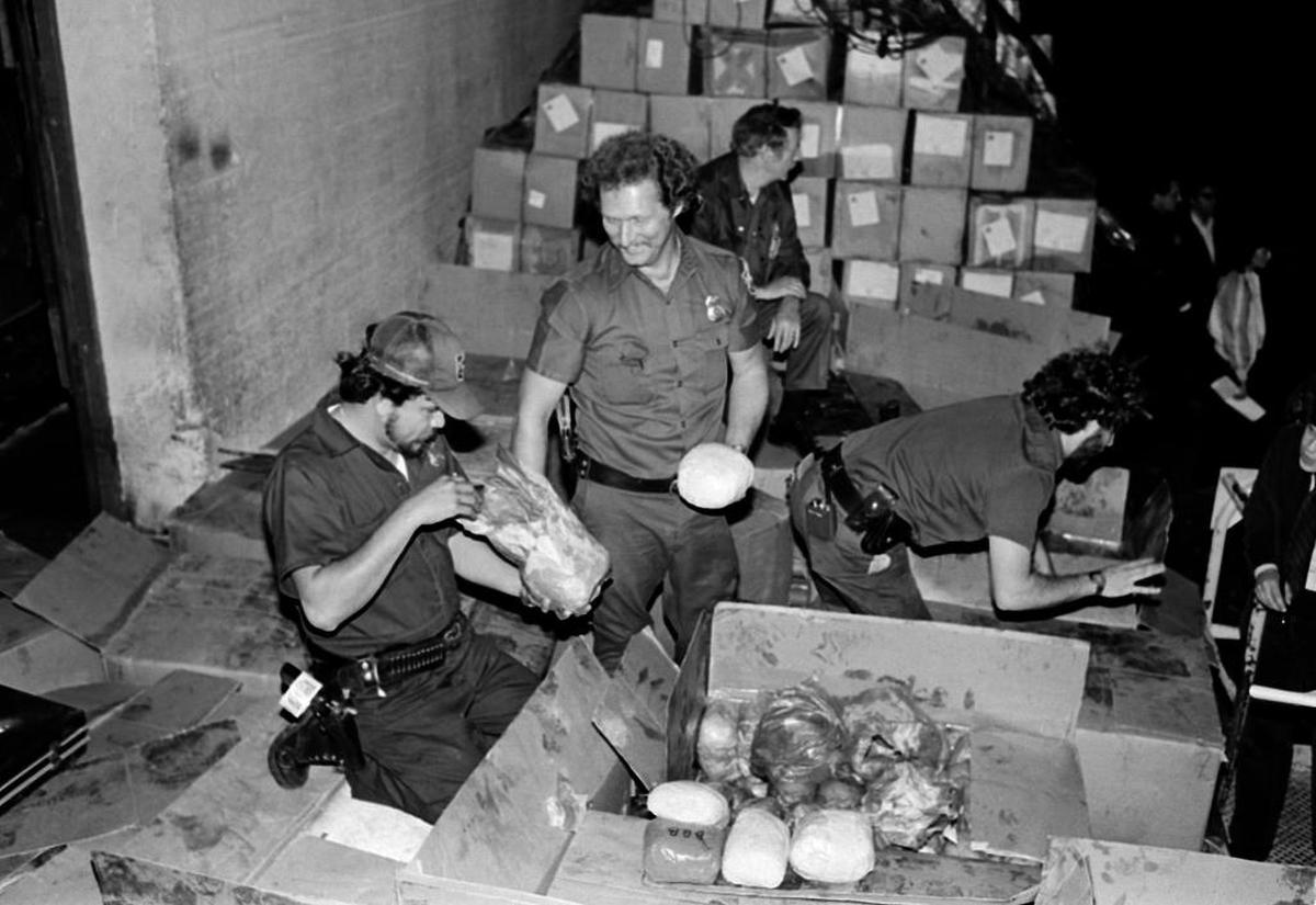Nearly two tons of Colombian cocaine worth an estimated $175 million was seized at a Miami warehouse by U.S. Customs and Drug Enforcement agents in this March 10, 1982 file photo.