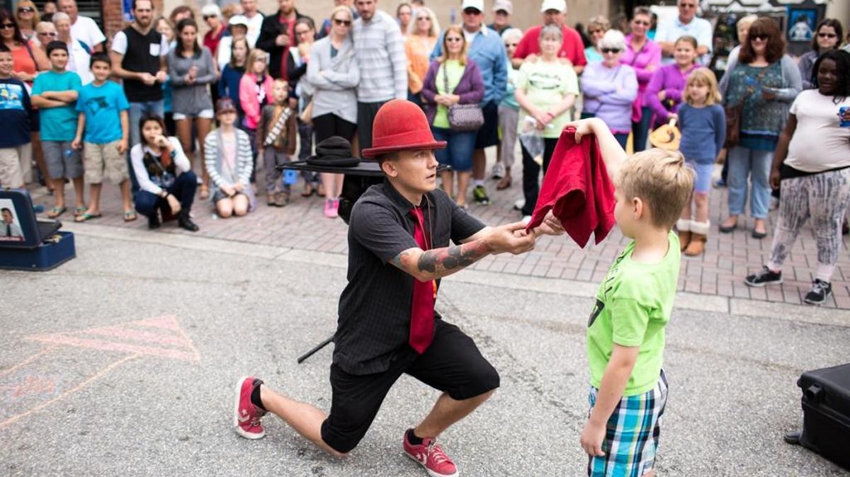 Magician George Gilbert entertains at a past ArtSlam.