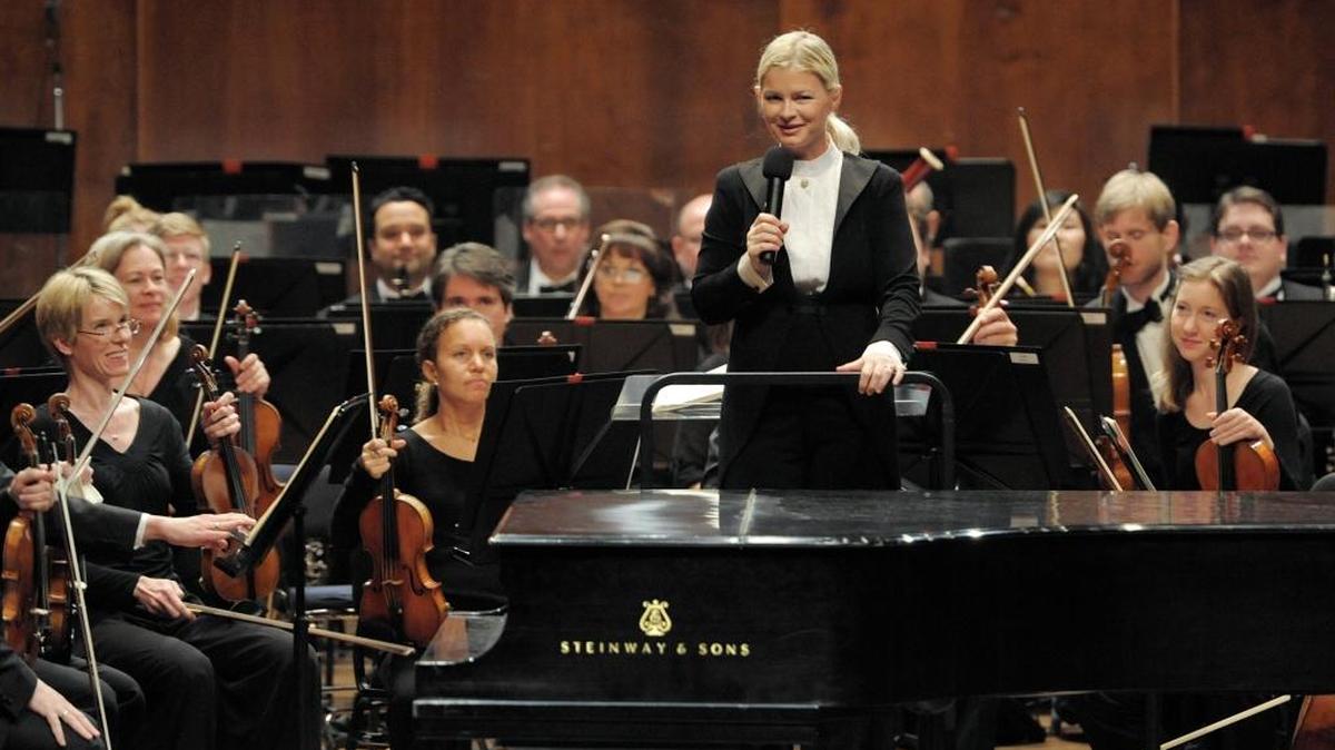 Anu Tali, the music director of the Sarasota Orchestra, gives a warm welcome to a group of over 600 middle schoolers from across Manatee County during a special performance in January 2015 at the State College of Florida.