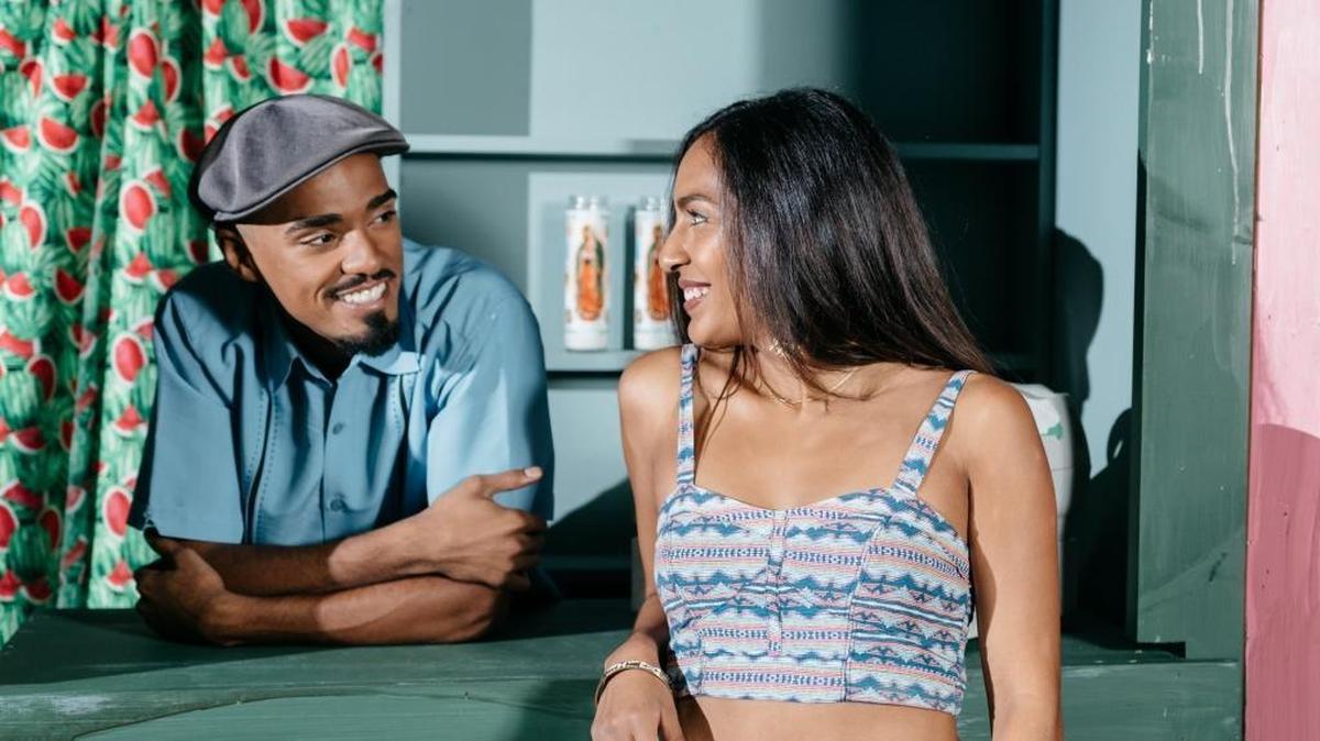 Usnavi (Michael Mendez) and Vanessa (Marissa Buchheit) enjoy a flirtatious moment in WBTT’s production of “In the Heights.”