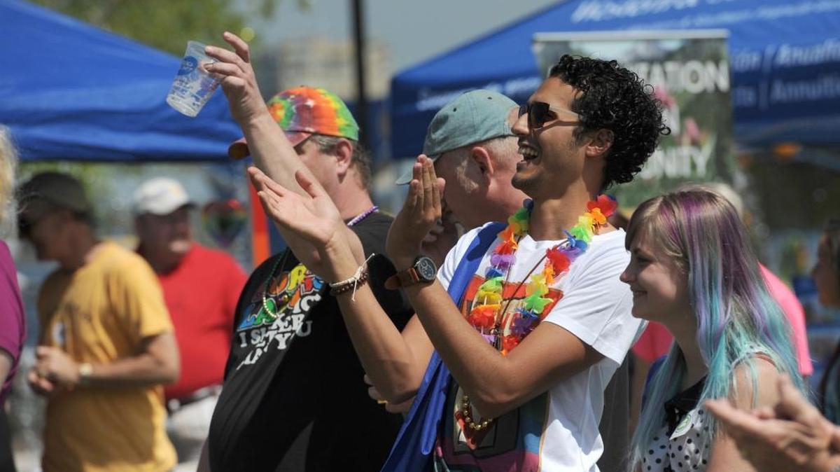People gather at a past Manatee County Pride Festival at Bradenton’s Riverwalk pavilion. The festival was organized by Prism, a local nonprofit that serves young people, ages 13-23, who are lesbian, gay, bisexual or transgender.