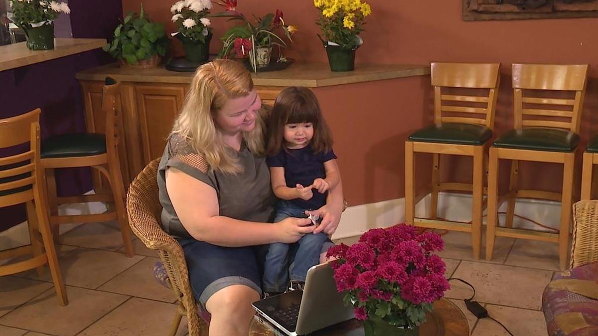 Nicole and her daughter, May, video chat with Nicole’s fiance.