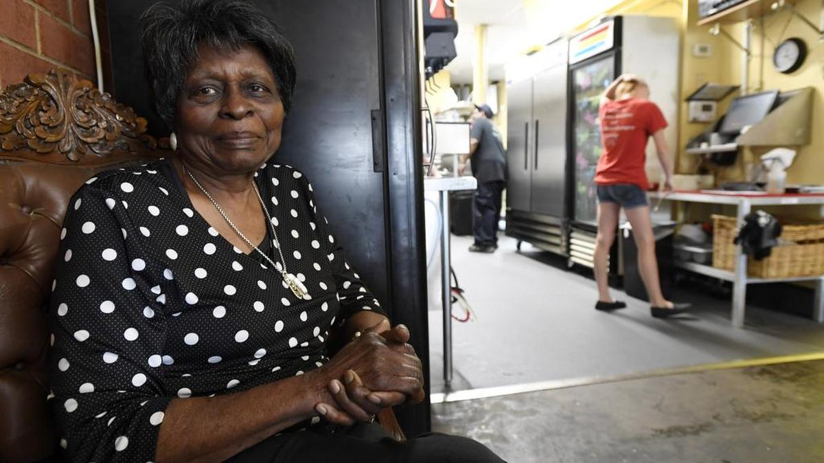 “Mama Louise” Hudson sits in her chair in the corner of the dinning room at H and H Restaurant in late May.