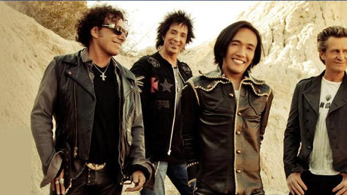 Journey, above, the Doobie Brothers and Dave Mason perform at the MidFlorida Credit Union Amphitheatre on Friday.