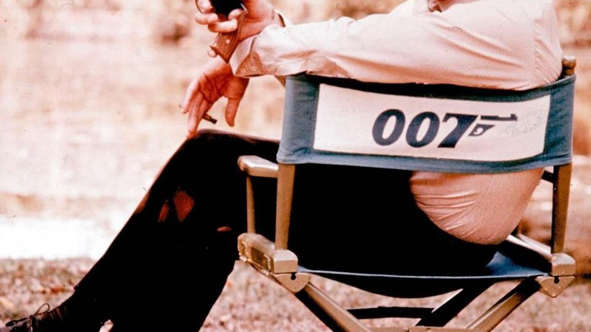 British actor Roger Moore, playing the title role of secret service agent 007, James Bond, is shown on location in England in 1972. Moore, played Bond in seven films, more than any other actor. Roger Moore's family said Tuesday May 23, 2017 that the former James Bond star has died after a short battle with cancer.