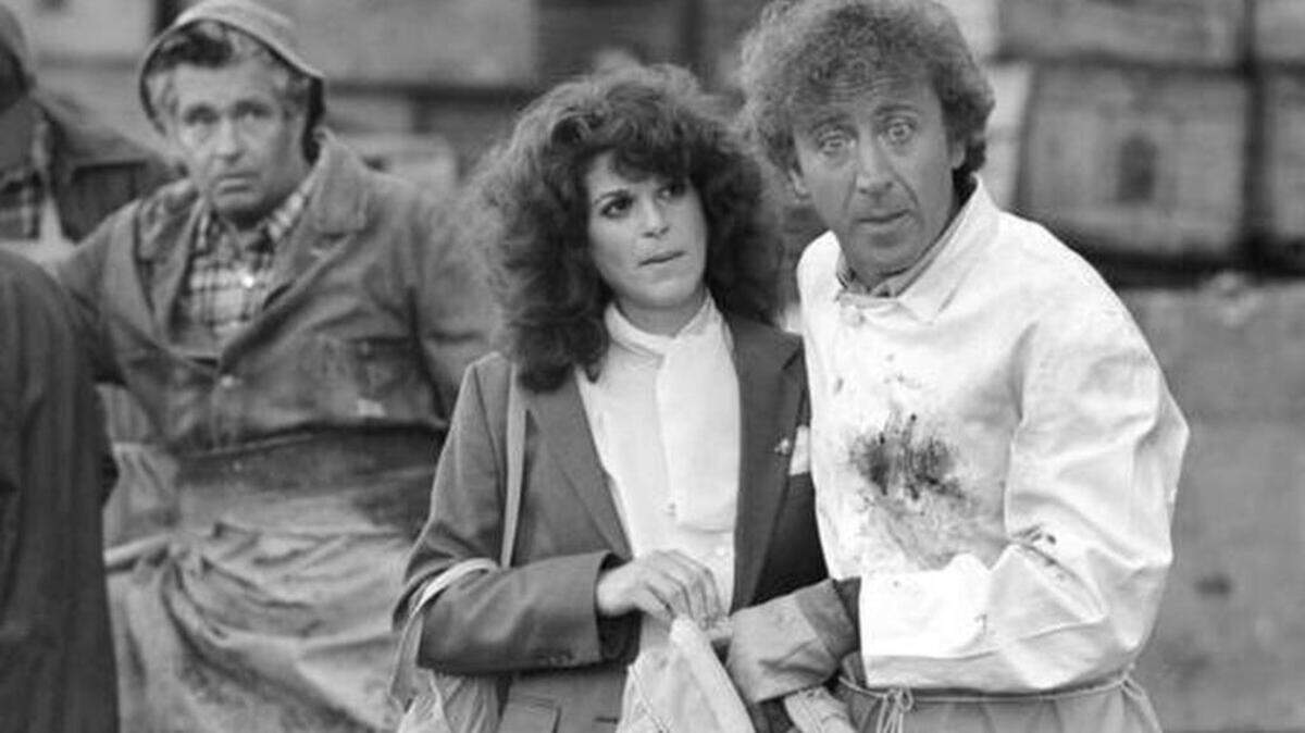 FILE - In this Aug. 27, 1981 file photo, Gilda Radner, center, and Gene Wilder, right, perform in a scene from the film "Hanky Panky," directed by Sidney Poitier in Boston. Wilder’s nephew said Monday, Aug. 29, 2016, that the actor and writer died late Sunday at his home in Stamford, Conn., from complications from Alzheimer’s disease. He was 83.