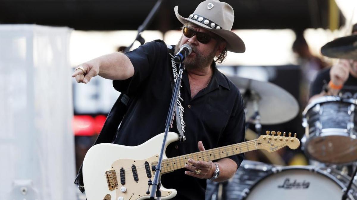 Hank Williams Jr. performs before the NASCAR Sprint Cup Series auto race, Saturday, Aug. 24, 2013, in Bristol, Tenn.