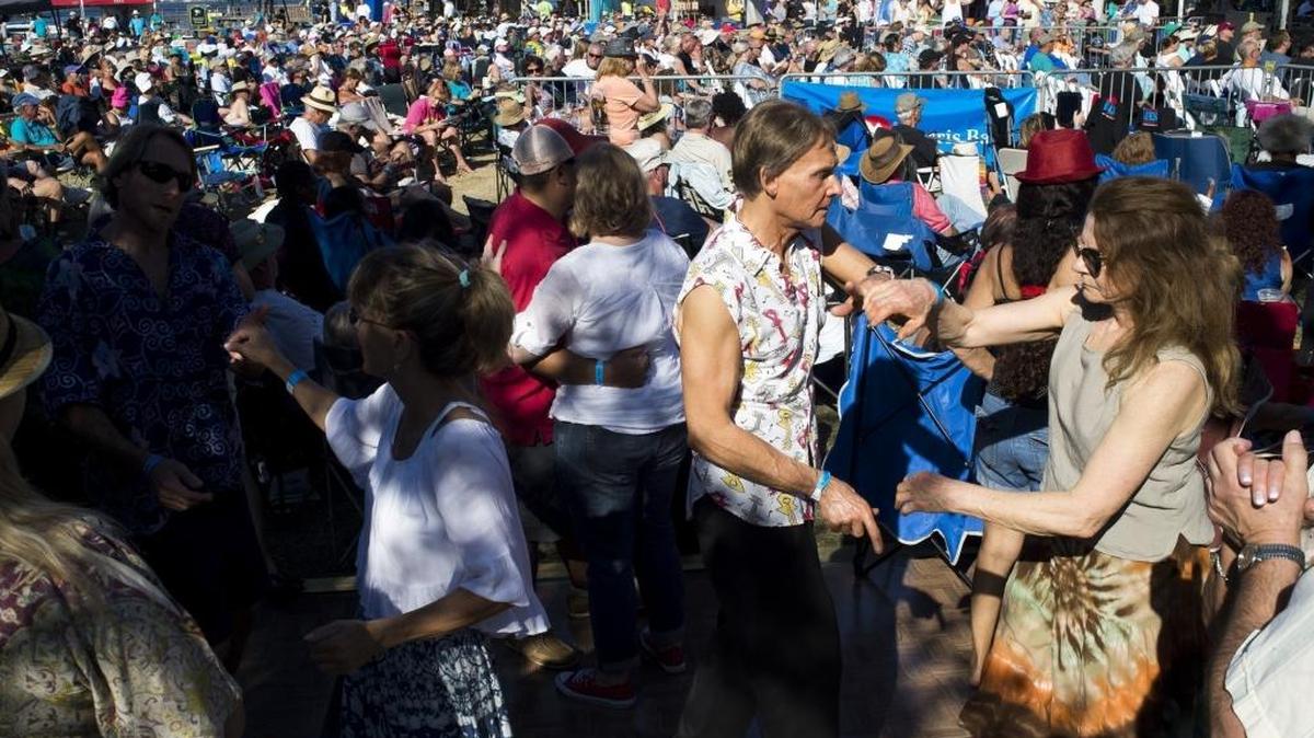 Larry Kraig, of Clearwater, and Janeen Rosas, of Anna Maria Island, dance to Larry McCray’s performance during the Fifth Annual Bradenton Blues Festival last year on the Bradenton Riverwalk.