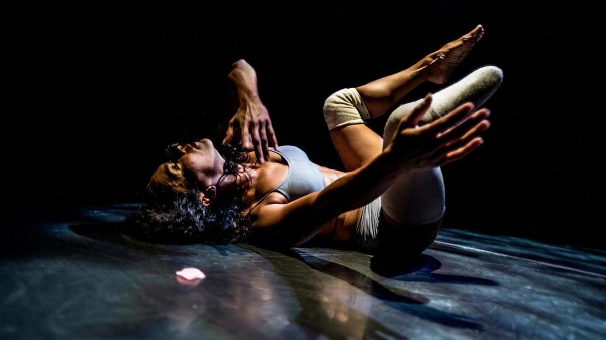 Stephanie Bastos, a dancer who lost half of one leg in a car accident, performs in “Timeline” a work by Sarasota Contemporary Dance that tells the story of her life.