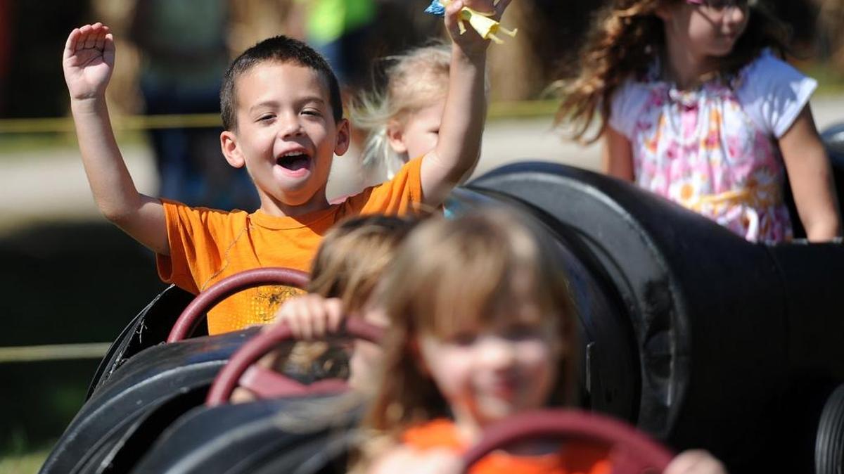Children enjoy a train ride at Hunsader Farms’ Pumpkin Festival in East Manatee. The festival continues Oct. 21-22 and 28-29.