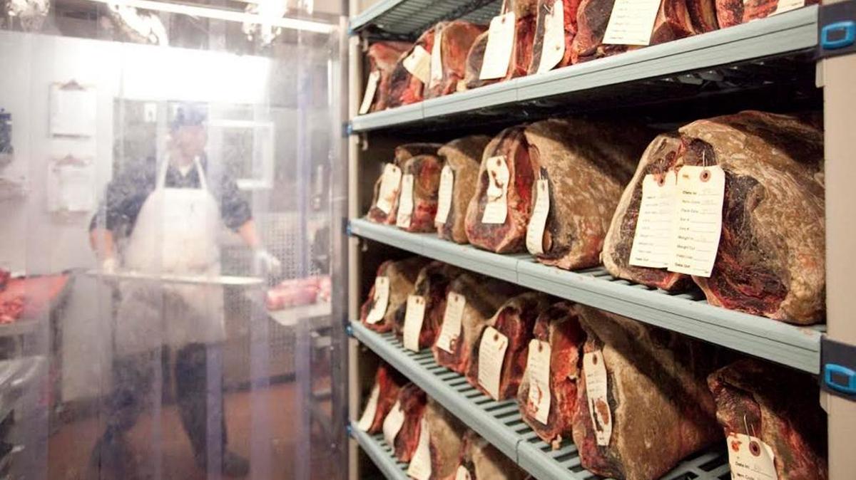 In the dry aging cooler at Capital Grill at the Mall at University Town Center, beef is kept at a constant 78-percent humidity until it is time for it to be carved, cooked and served.