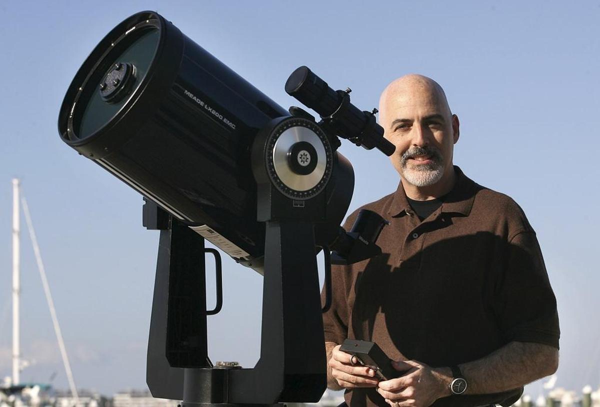 Jonathan Sabin of the Deep Sky Observers with his Meade Schmidt-Cassegrain telescope.