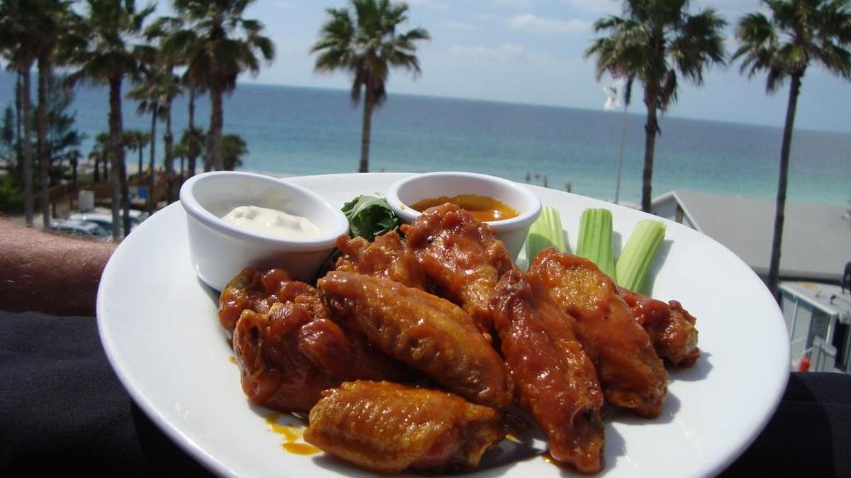 Try the Island Time Bar & Grill’s award-winning “Cajun Gold”-flavored chicken wings.