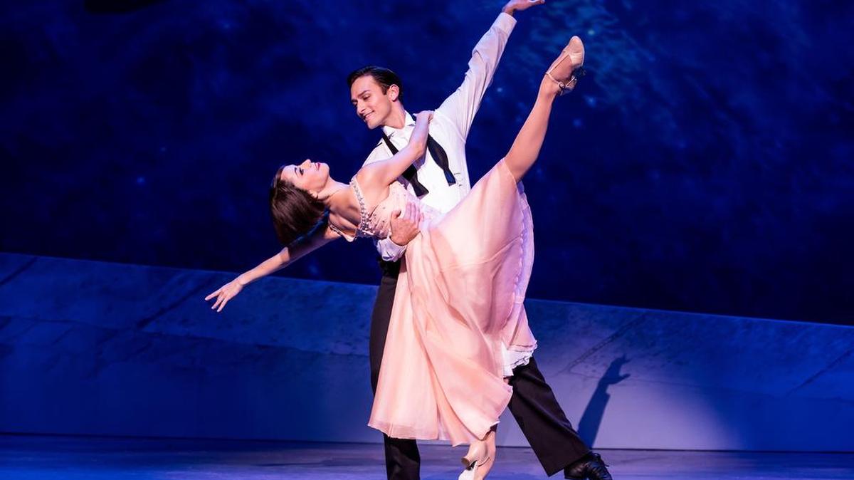 Garen Scribner is the Gene Kelly character and Sara Estny has Leslie Caron’s part in the musical based on the 1951 movie musical.