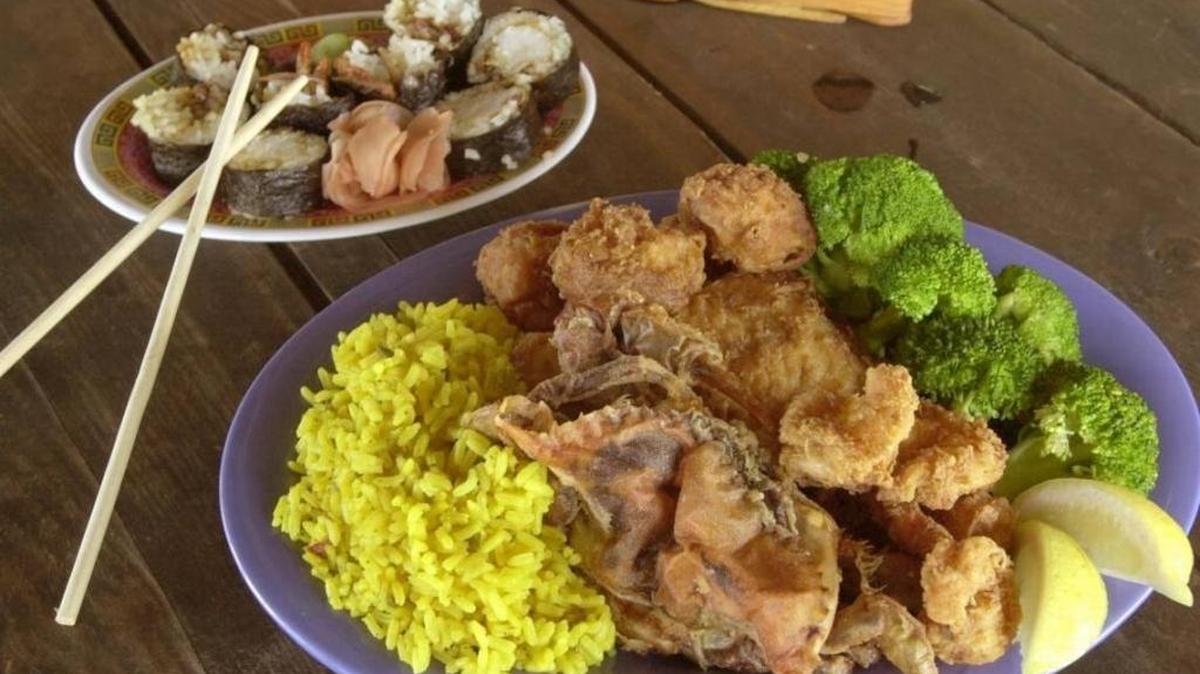 The seafood platter with fried scallops, shrimp, stuffed crab and grouper with saffron rice and broccoli, and a selection of sushi rolls are all popular choices at the Cortez Kitchen.