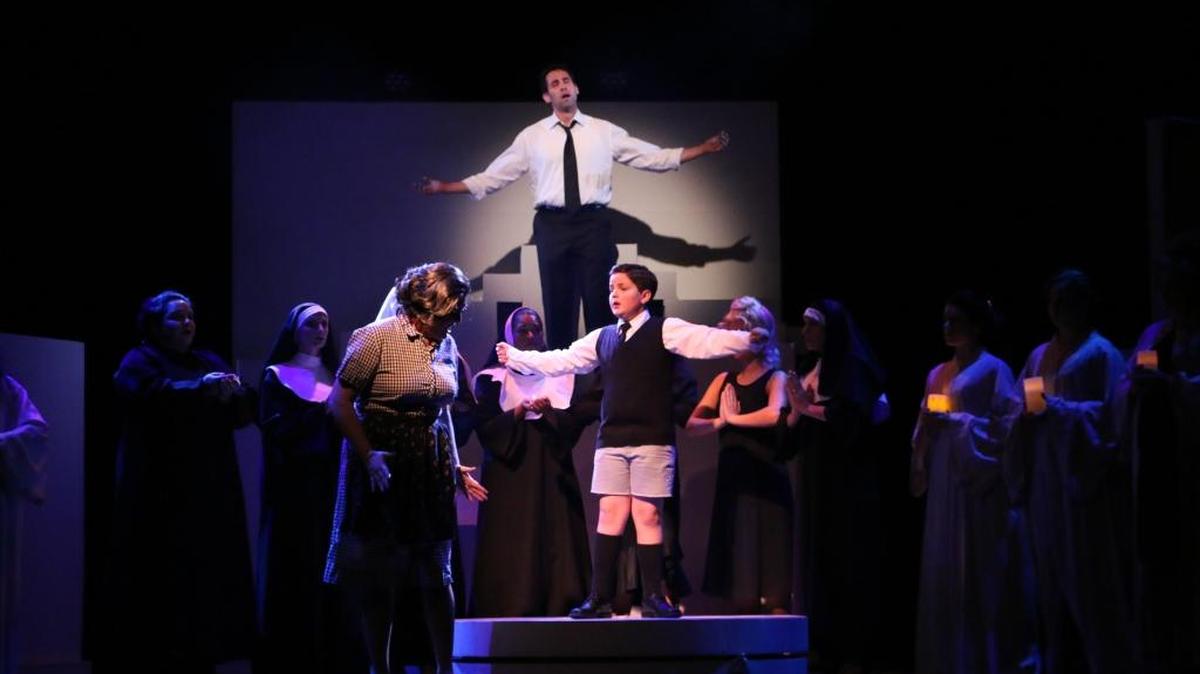 Omar Montes (Guido Contini), MariAnne Hernandez (Guido’s mother) and Asher Woomert (Young Guido) in the Manatee Players’ production of “Nine.”