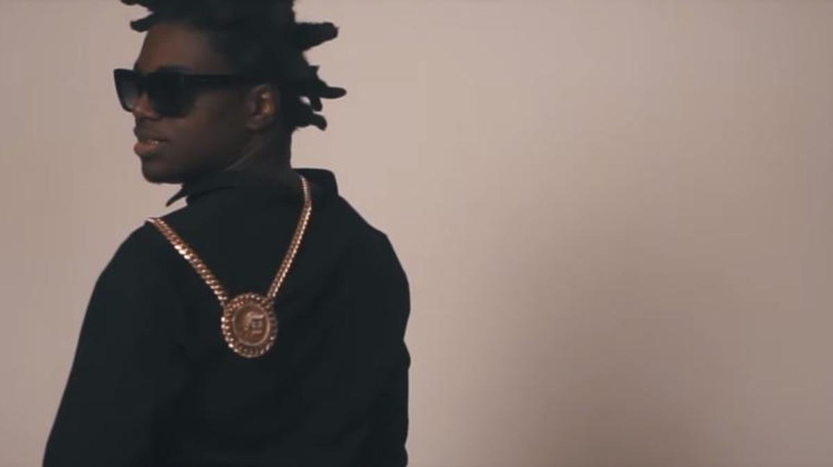 A screenshot of Kodak Black in his video for “There He Go,” directed by Yung Mik3.