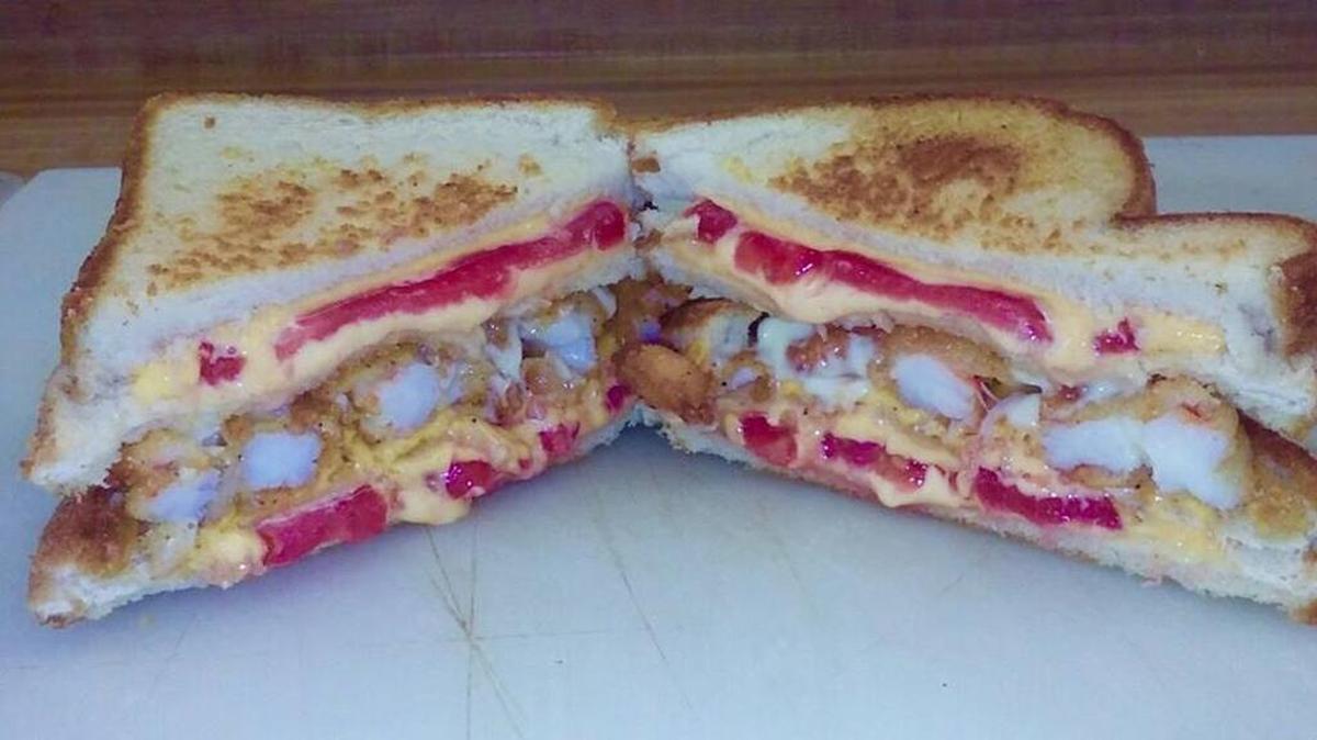 Holloway BBQ and Seafood Co. will be featuring a Grilled Cheese grouper sandwich at the Aug. 20 Grilled Cheese Festival in Palmetto. Pictured here is their shrimp BBQ Po’ Boy grilled cheese.