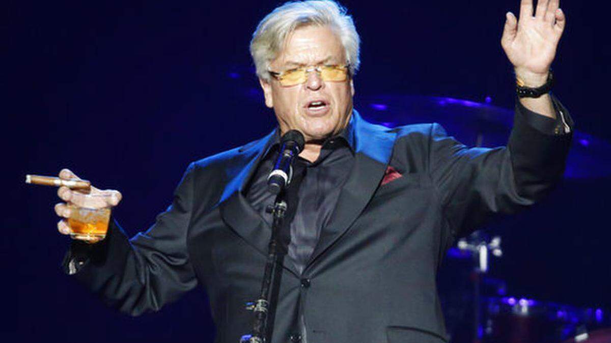 Ron White performs at a benefit concert honoring first responders and those affected by the recent Las Vegas mass shooting, Thursday, Oct. 19, 2017, in Las Vegas. Some survivors of the mass shooting said they were ready for closure, though they confessed feeling engulfed by anxiety and security fears while gathering in a large group for the first time since the attack.