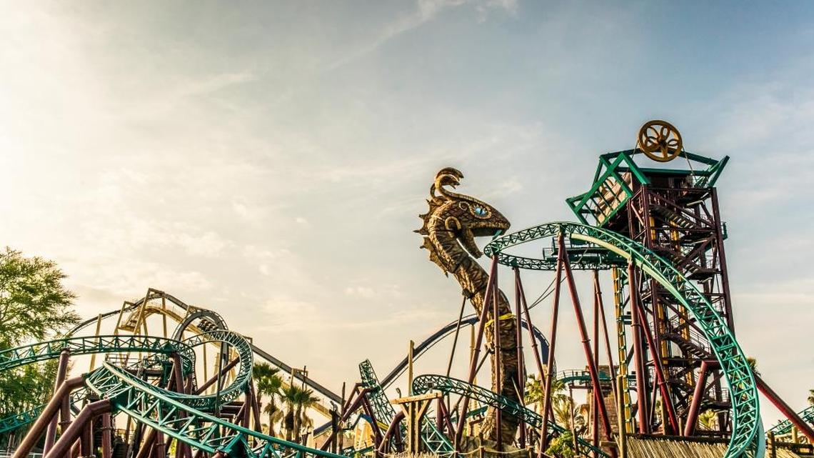 Cobra’s Curse rides speed along at 40 miles per hour down 2,100 feet of serpentine track, traveling backward, and forward and then spinning freely.