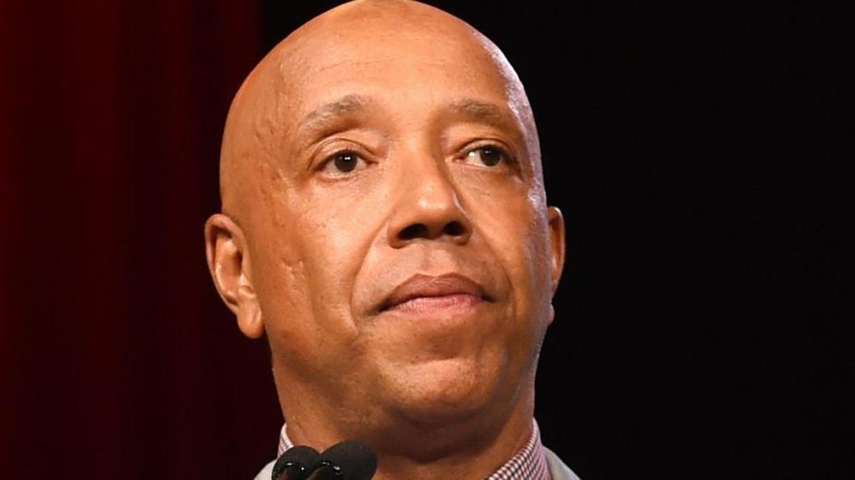 FILE - In this July 18, 2015, file photo, Russell Simmons speaks appears at the RUSH Philanthropic Arts Foundation's Art for Life Benefit in Water Mill, N.Y. Three women have told the New York Times that music mogul Russell Simmons raped them. Simmons, in a statement to the paper, vehemently denied what he called “hese horrific accusations,” saying all his relations have been consensual.