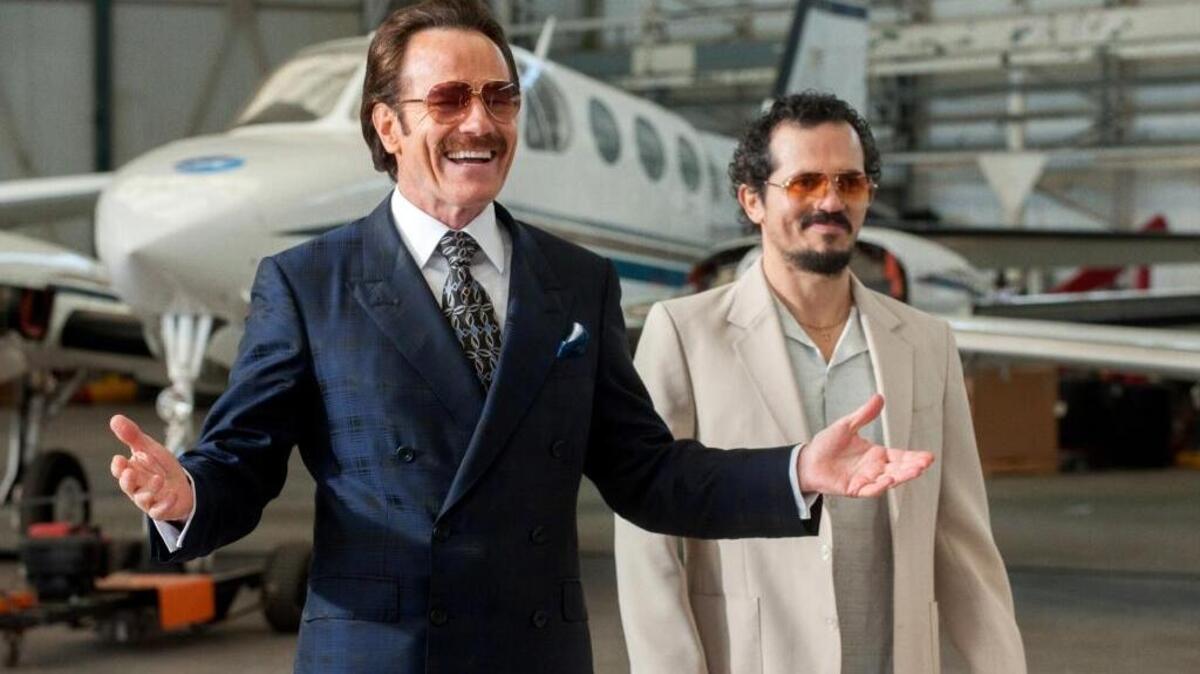 Bryan Cranston, left, and John Leguizamo appear in a scene from, “The Infiltrator.”