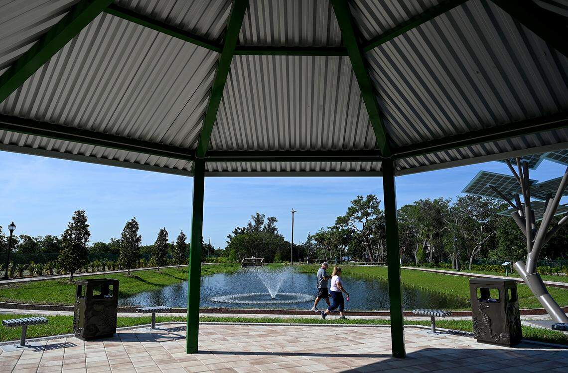 Ed and Kimberley Lee enjoy walking in the new Connor Park in Palmetto. The land was a brownfield remediation, and now provides filtering of runoff water in the area.