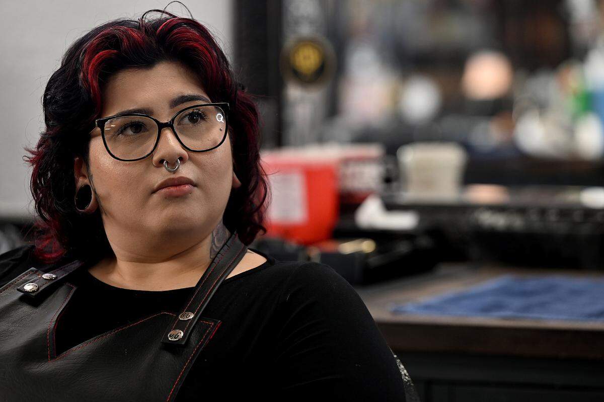 Emily Urdiales is a barber at the Oxford Barbershop in downtown Bradenton.
