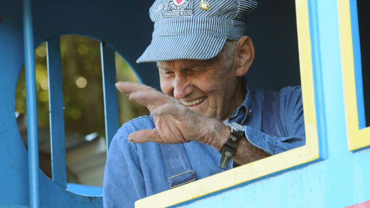 Engineer Gene Haggerty waves to children the Thomas the Tank Engine at the Florida Railroad Museum in Parrish.