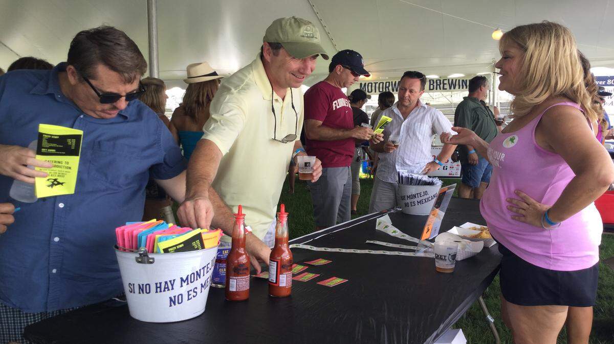 Area restaurants offered their spins Saturday on bacon dishes at the Beer, Boats & Bacon Festival at Nathan Benderson Park.MARK YOUNG/Bradenton Herald