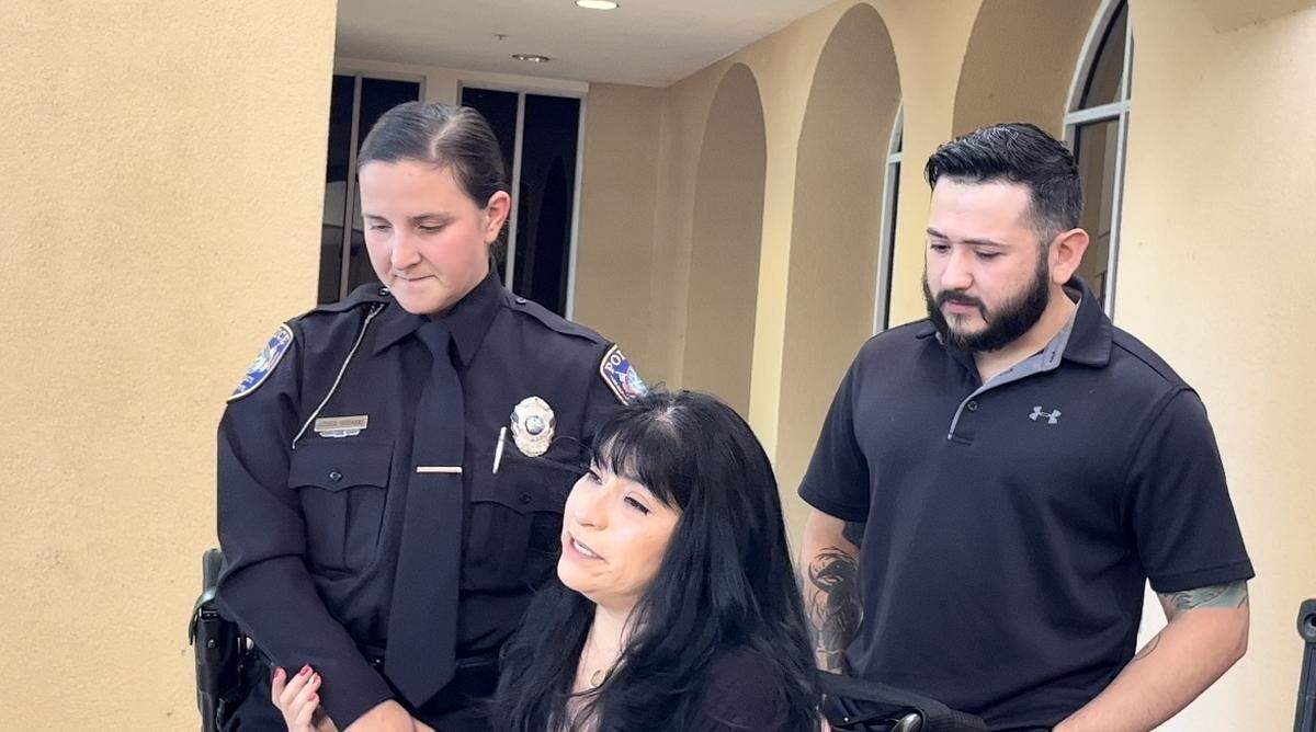 Officer Jessica Sirignano was embraced by Martha Stroup whose life she saved after she was thrown from a motorcycle that she rode with her Husband Joe Stroup on Jan 29., on U.S 41 in Palmetto Sirignano tried to save them both but Joe Stroup later died.