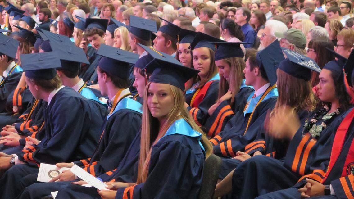 Graduating seniors at Bradenton Christian School look on as Superintendent Dan Vande Pol addresses the audience. 63 seniors received their diplomas at Bayside Community Church Friday night.