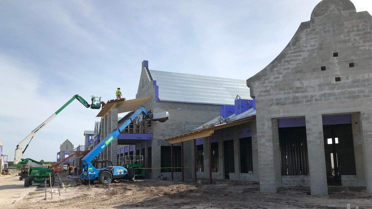 Buildings that will house restaurants and shops have gone up along the main retail street in Lakewood Ranch’s Waterside Place, a new town center that is under development.