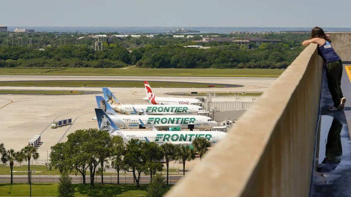 Frontier Airlines planes sit on the tarmac at Tampa International Airport on Monday, April 4, 2022. The low-budget carrier is launching three new international routes out of Tampa International Airport to Punta Cana and Santo Domingo in the Dominican Republic and Jamaica’s Montego Bay.