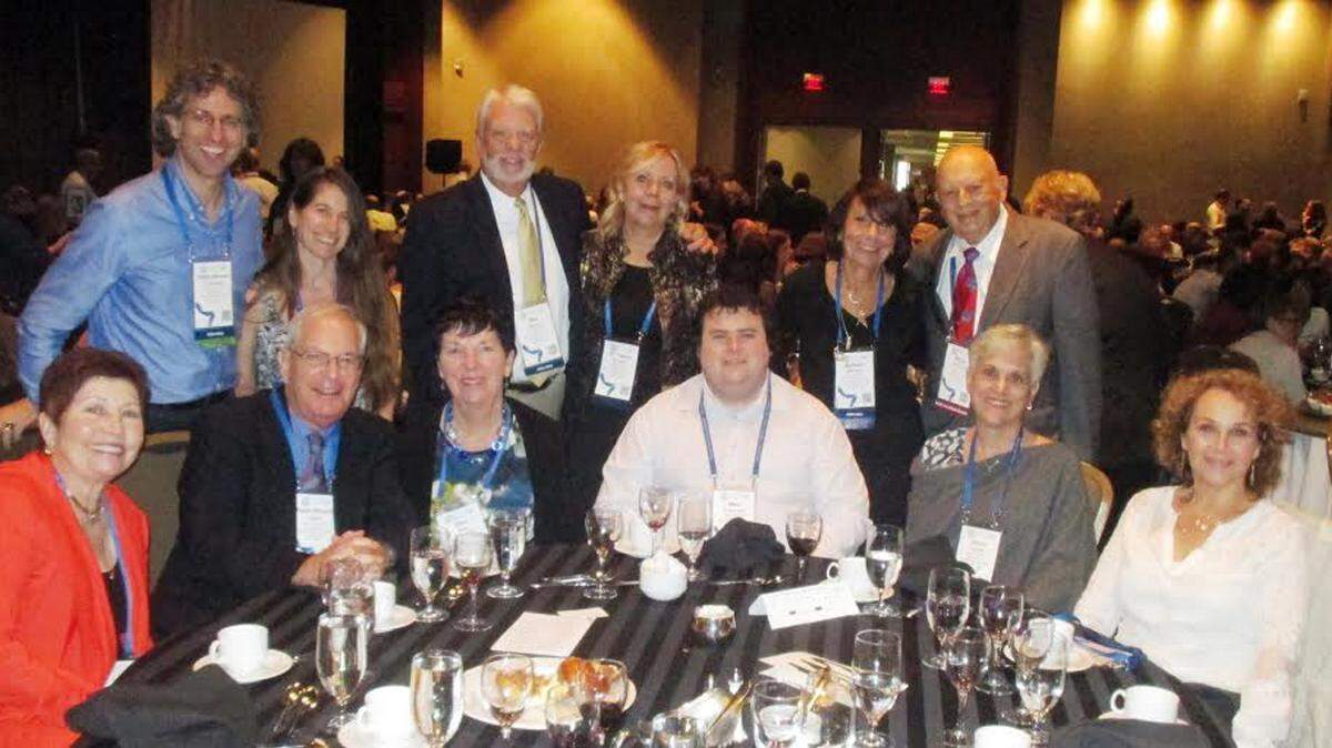 Back row, from left: Temple Emanu-El delegates include: Rabbis Brenner Glickman and Elaine Rose Glickman, administrator Ken Marsh, Dr. Tanice Knopp, Barbara Meltzer, Phil Meltzer. Front row: Vice President of Education Toby Halpern, associate Rabbi Richard Klein, Ellen Klein, Matthew Anderson, President Gloria Weed and Vice President of Ritual Marian Raupp. PHOTO PROVIDED