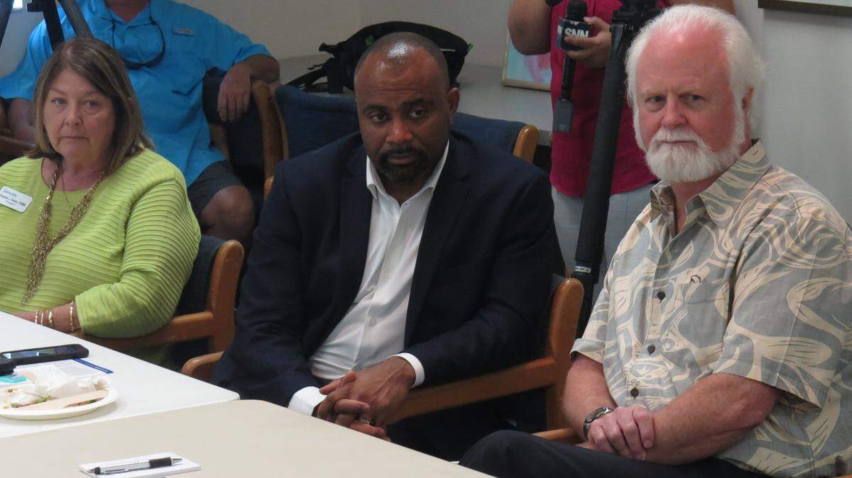 Department of Economic Opportunity Executive Director Ken Lawson, who was then the CEO of Visit Florida, participates in a red tide meeting in August 2018 at Mote Marine Laboratory & Aquarium at Mote’s facility in Sarasota.  At left is Visit Sarasota President Virginia Haley, and at right is Mote Marine President Dr. Michael Crosby.