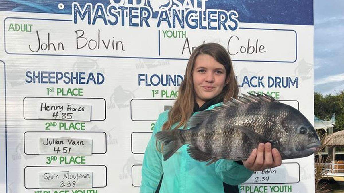 Autumn Wiggins, daughter of Capt. Chis Wiggins, poses with her first place youth sheepshead from the Old Salt Fishing Foundation’s Johnny Keller Inshore Fishing Tournament on Jan. 22, 2022.