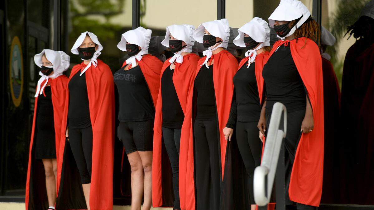 08/24/21-In a demonstration against Manatee County’s proposed abortion ban, a group of women dressed as characters from “The Handmaid’s Tale” protested against the plan.