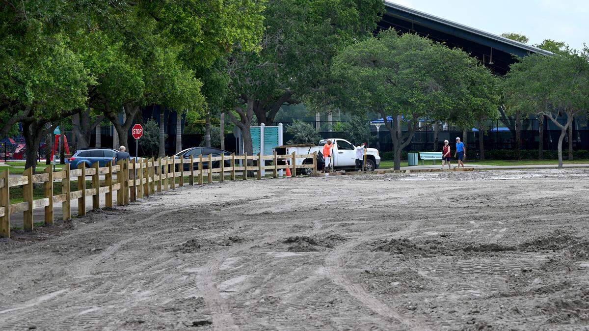 Fencing is being installed at an overflow parking lot under construction at G.T. Bray on Thursday, May 16, 2024.