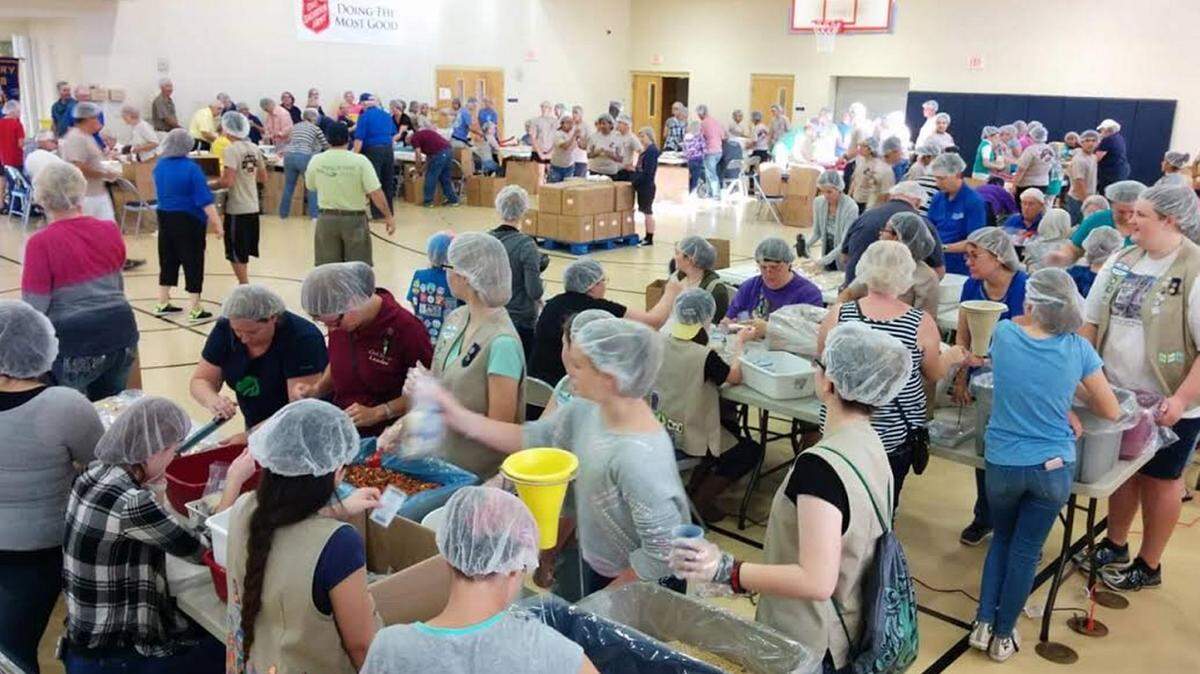 More than 200 members of the Rotary Club of Bradenton and community volunteers packaged 50,000 meals in less than 3 hours April 9 for the annual Rotarians Against Hunger food packing and distribution program. 
 PHOTO PROVIDED