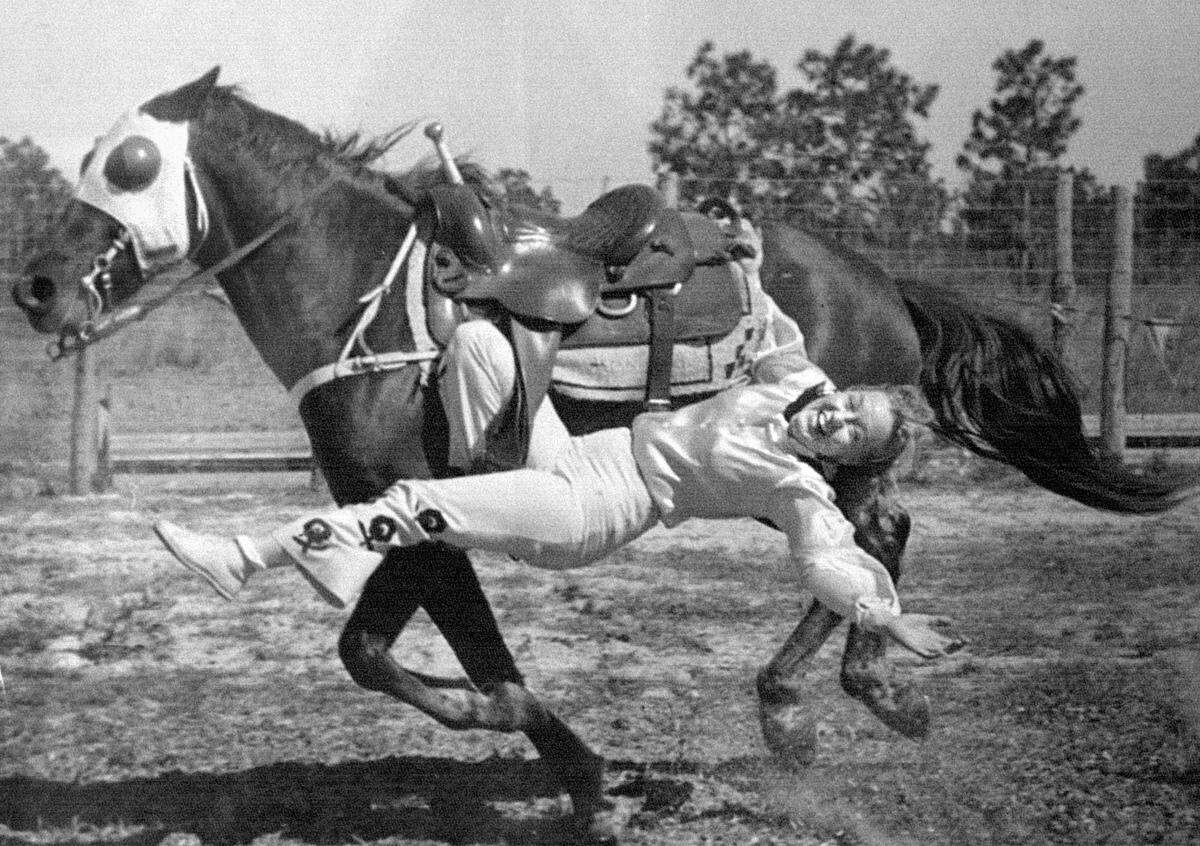 In this 1930s photo, Faye Blackstone performs a rodeo trick she created. The Parrish resident was inducted into the National Cowgirl Hall of Fame and the Manatee County Agriculture Hall of Fame.