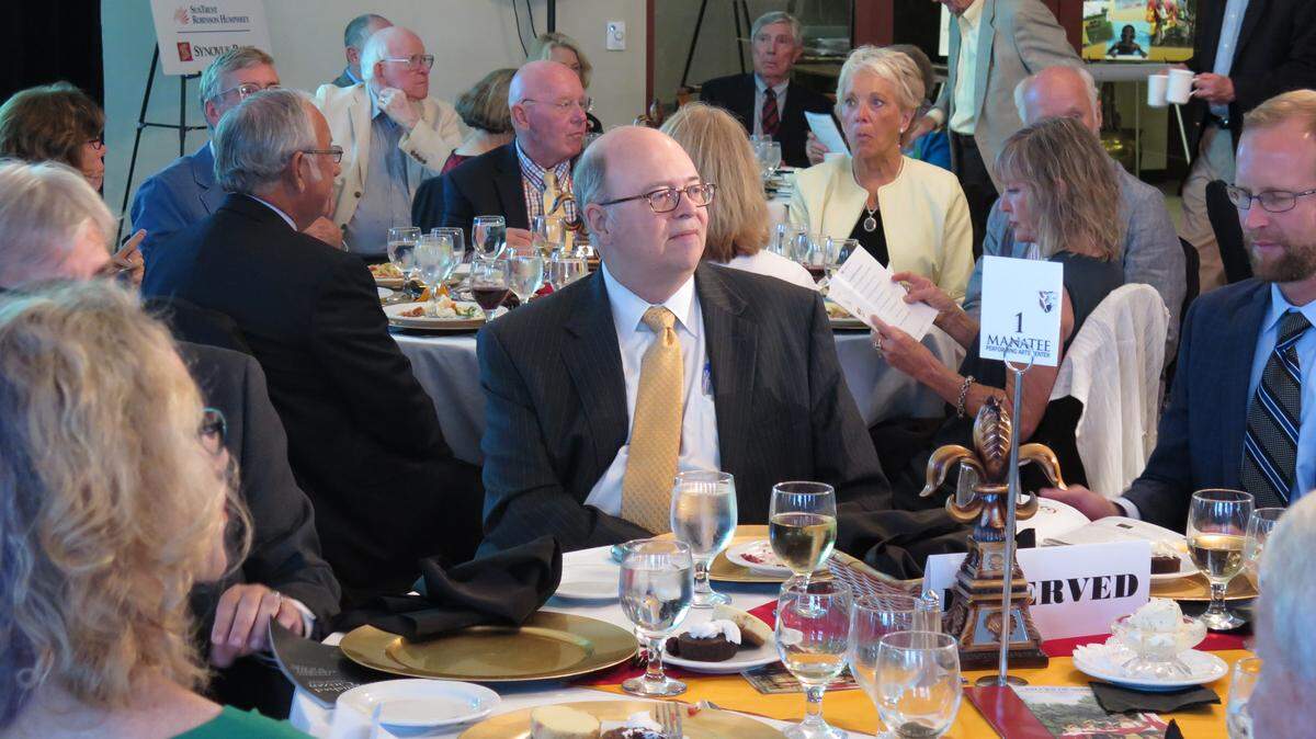 Cliff L. Walters, 66, sits at a table Thursday at a ceremony by the Southwest Florida Council, Boy Scouts of America. Walters was honored with the sixth annual Distinguished Citizen Manatee District "Good Scout" Award.AMARIS CASTILLO/Bradenton Herald