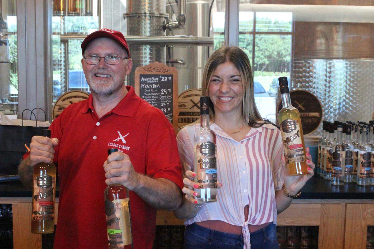 Loaded Cannon Distillery at Lakewood Ranch has converted its operation to making hand sanitizer. Shown above are Steve Milligan and Michelle Russell.