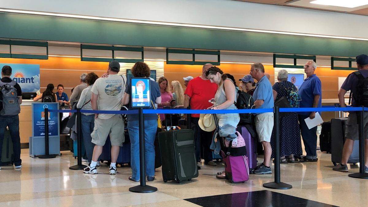11/13/2019--Prior to the COVID-19 pandemic, travelers bunched up at ticket counters at Sarasota Bradenton International Airport to check their bags, helping drive passenger traffic to record levels.