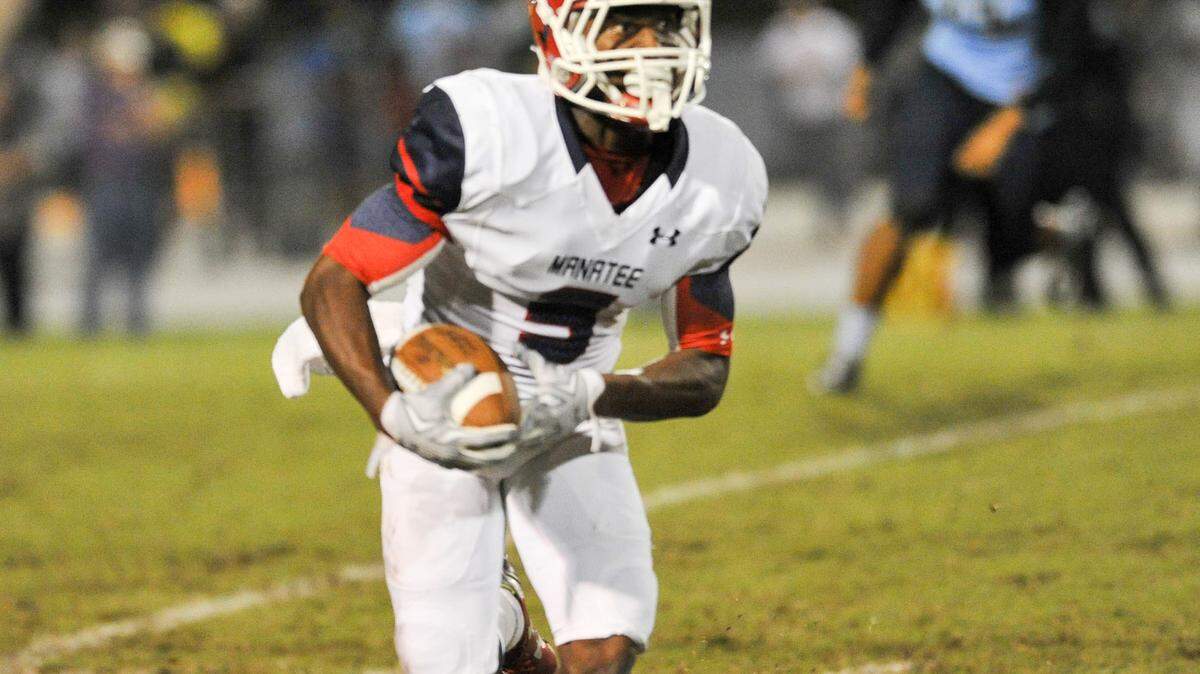 Manatee running back kavious price rushes for a touchdown