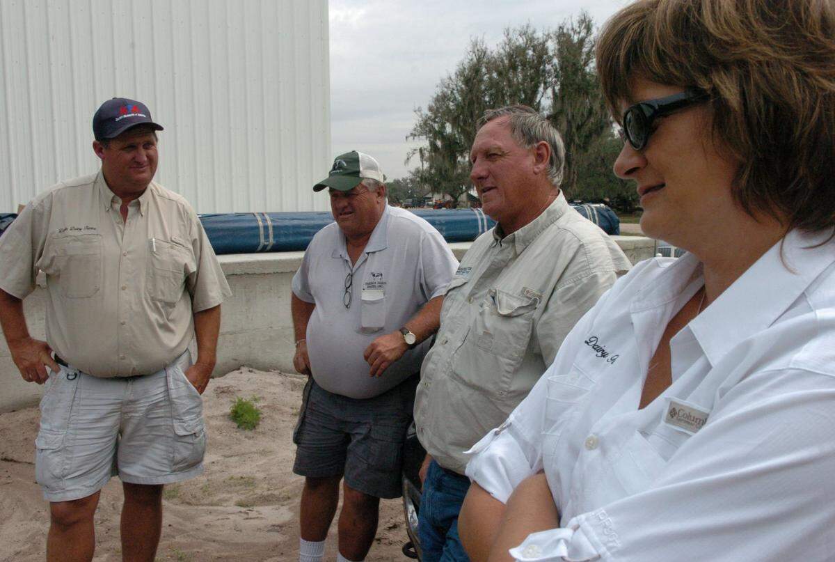 Jerry Dakin, Farren Dakin, Cameron Dakin, and Karen Dakin, of Dakin Dairy Farms in Myakka City, are shown in this Bradenton Herald file photo from 2008. The Dakin brothers have been selected for the Manatee County Agricultural Hall of Fame.