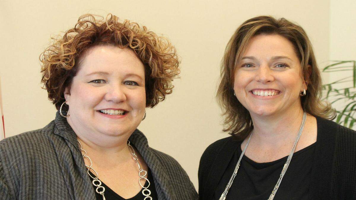 Eva Rey, left, completed her final meeting as executive director of Lakewood Ranch Town Hall on Thursday. At right is her replacement, Anne Ross. 
 JAMES A. JONES JR./Bradenton Herald