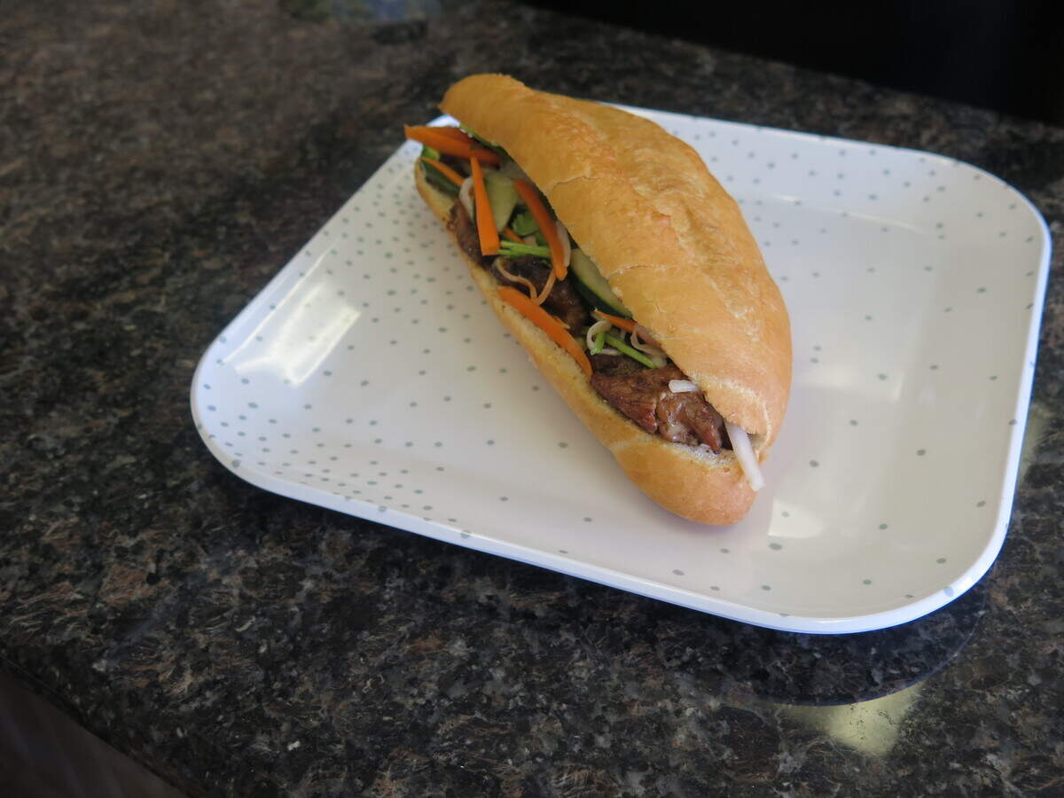 A banh mi sandwich is a traditional dish in Vietnam. At Little Saigon Cafe, the $4.99 sandwich contains your choice of chicken, pork or Vietnamese cold cuts as its protein along with pickled daikon and carrots, cucumber, jalapeno, cilantro and house mayo. The bread is homemade.