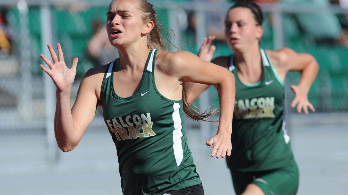 Saint Stephen's Episcopal School's Dasha Fomina and Anika Kennedy run in the girls 100-meter dash during the Manatee County Varsity Track and Field Championships on Tuesday at Saint Stephen's Episcopal School in Bradenton.GRANT JEFFERIES/Bradenton Herald